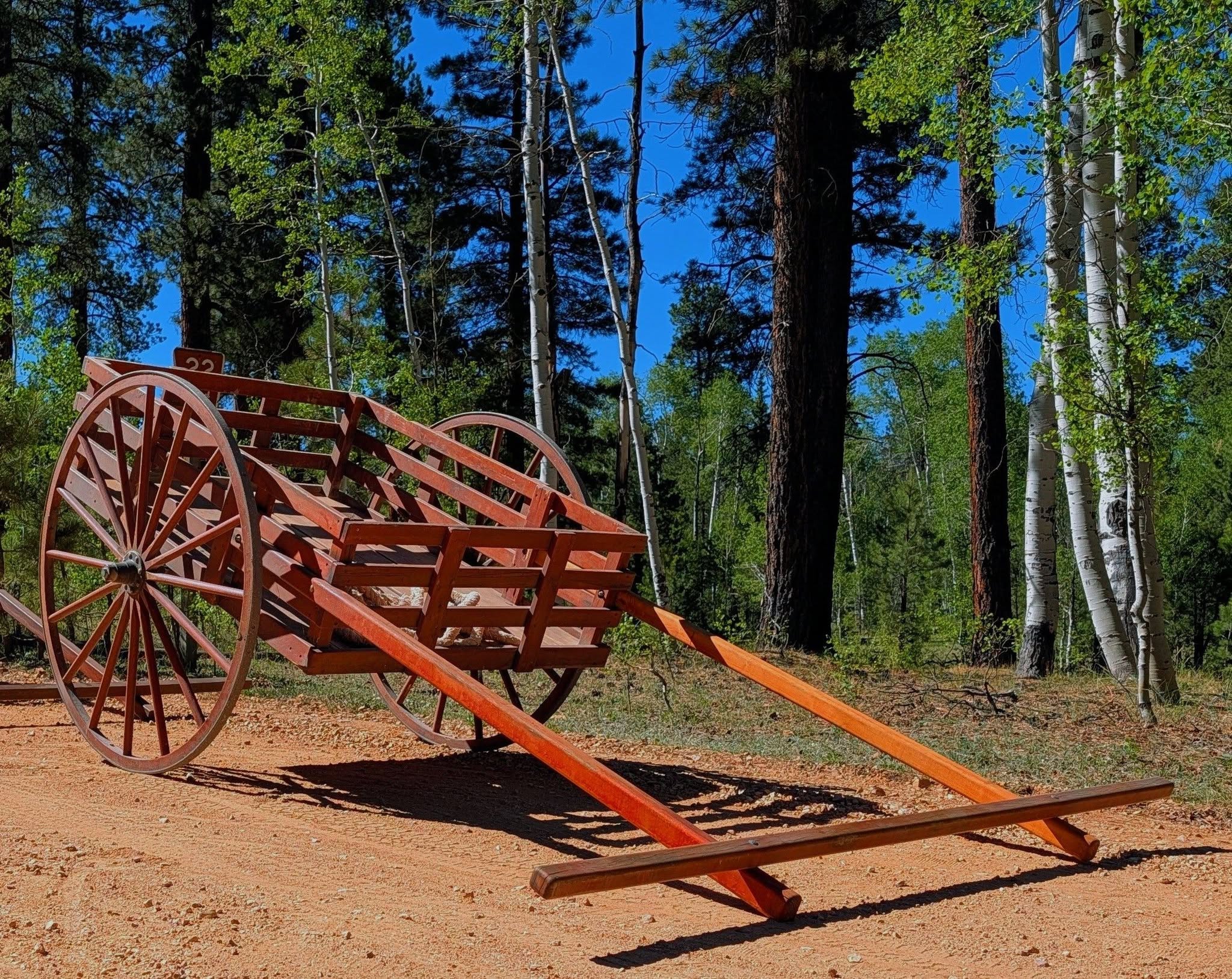 LDS trek leaders and youth preparing for a pioneer handcart trek experience